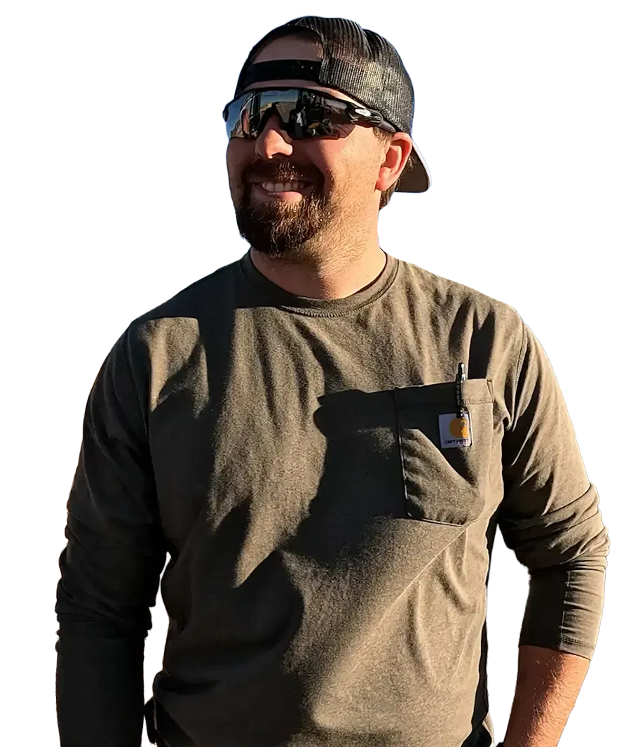 Dallas Jones portrait, looking at the viewer. He is against a transparent background.