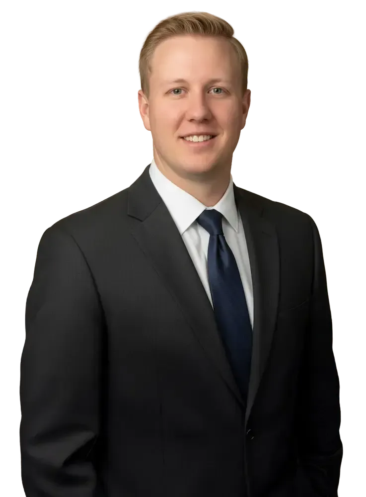 Jay Tobey Jay Tobey in a suit smiling, looking at the viewer. He is against a tansparent background.