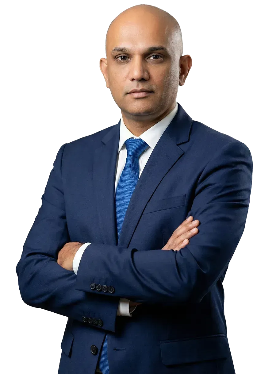 Sooraj Chandrasekharan portrait, looking at the viewer. He is against a transparent background.