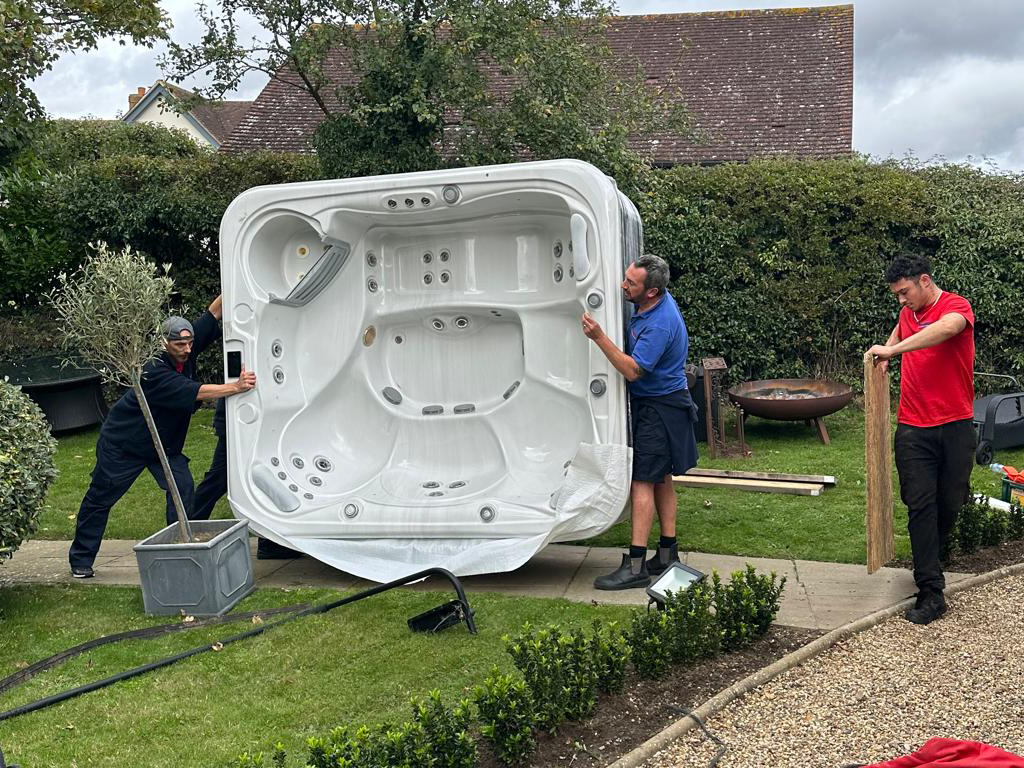 AJ Stephenson Removals team moving a tob just to it's new home