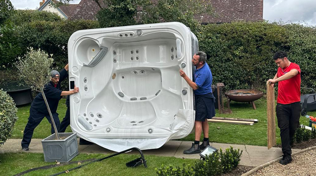 AJ Stephenson Removals team moving a tob just to it's new home