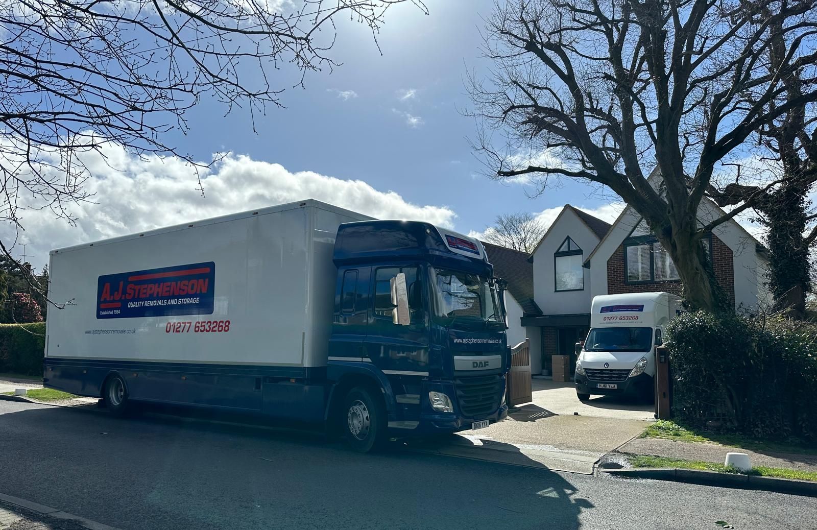 AJ Stephenson Removal Lorry moving a house.
