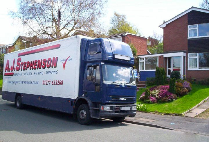 Removal lorry fully loaded ready to move