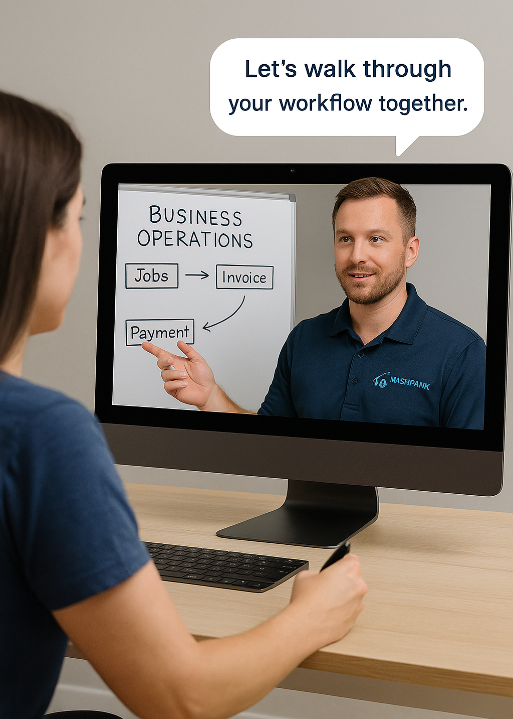 Woman watching a computer screen with a man on it.
