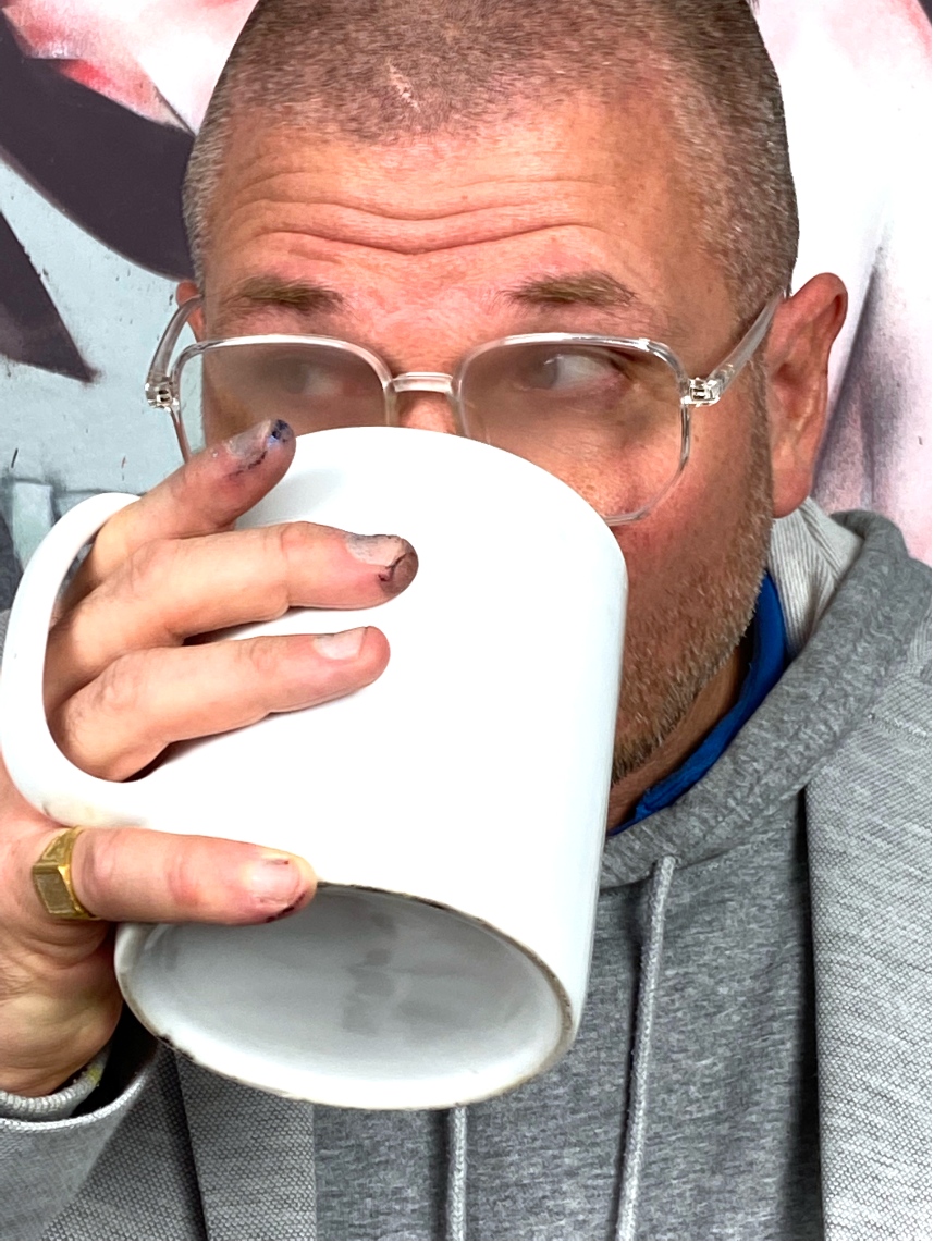 Artist-Chase-Cha-drinking-tea-in-studio-2023