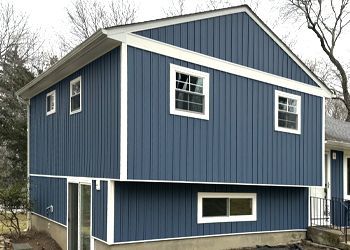 a house with a roof that is being repaired .