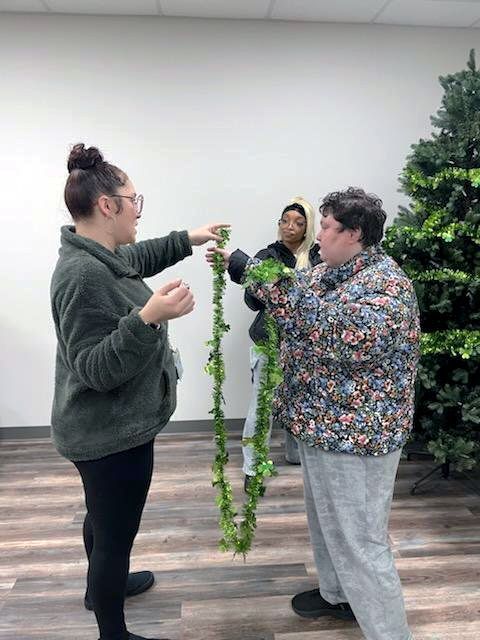 Amber & Heather G. decorating for St. Patrick's Day.