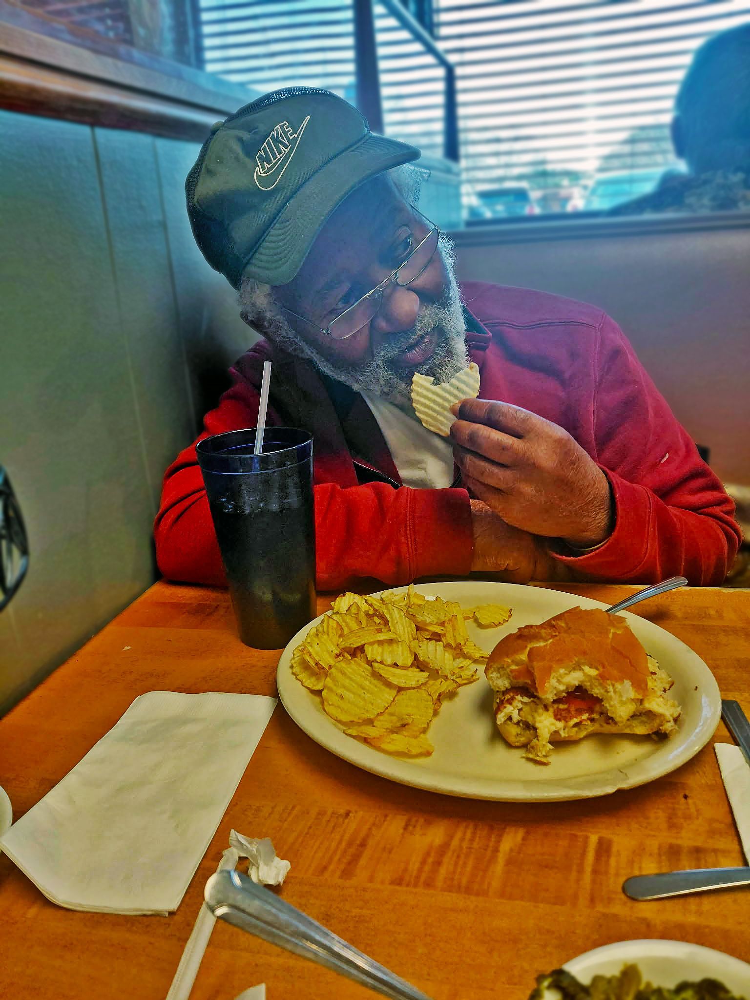 One client enjoying burger at Francis(March 2026)