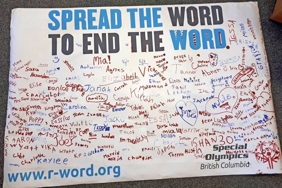 Students sign to pledge their support of ending use of the 'R' word. (Contributed photo)