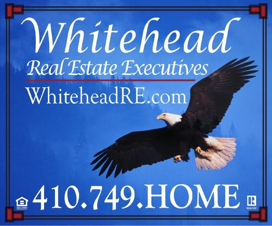 Logo of Whitehead Real Estate Executives