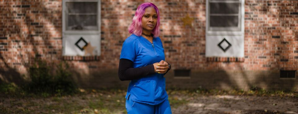 Shawanna Ferguson, a home health care worker, stands for a photograph outside of her home in Walterboro, S.C., on Sept. 20, 2020. Photo: Micah Green/Bloomberg