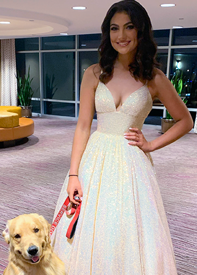 Alison Appleby and her service dog, Brady, are pictured at the Miss Dallas Teen pageant on Oct. 9, 2022. (Beth Appleby)