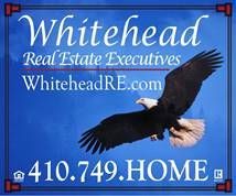 Whitehead Real Estate Executives LOGO