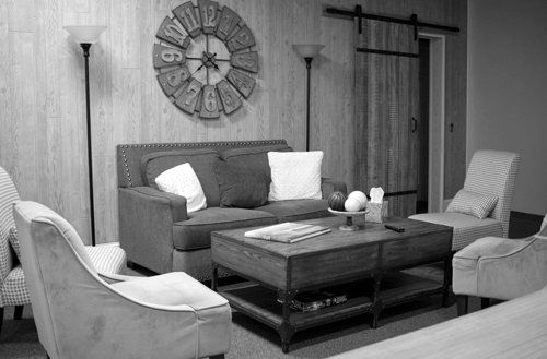 Empty Living Room Stock Photo by MINDY JACOBS on Unsplash