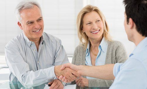 Old couple in a consultation session with the mortgage consultant 
