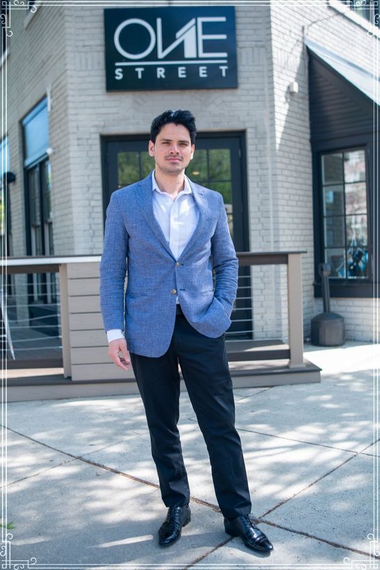 Pankaj is standing in front of ONE STREET office