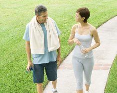 young couple smiling whilst having a conversation