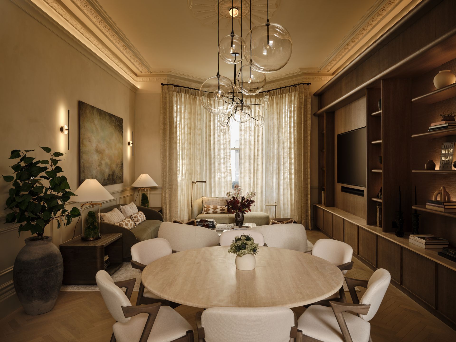 Living room with sofa, chairs, dining table, and chandelier.