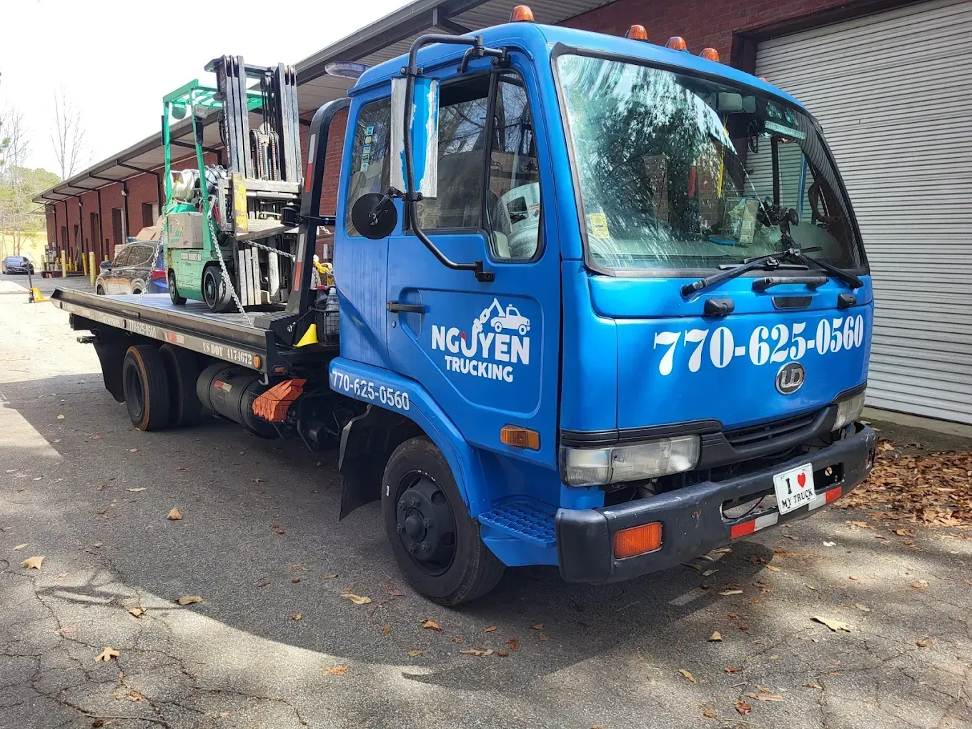 Blue tow truck with