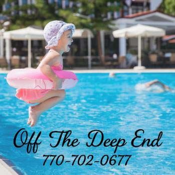 A young child wearing a swimsuit and swim cap, jumping into a pool with a flotation device.