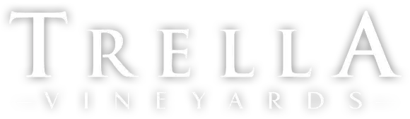 Trella Vineyards logo in white, shadowed letters.