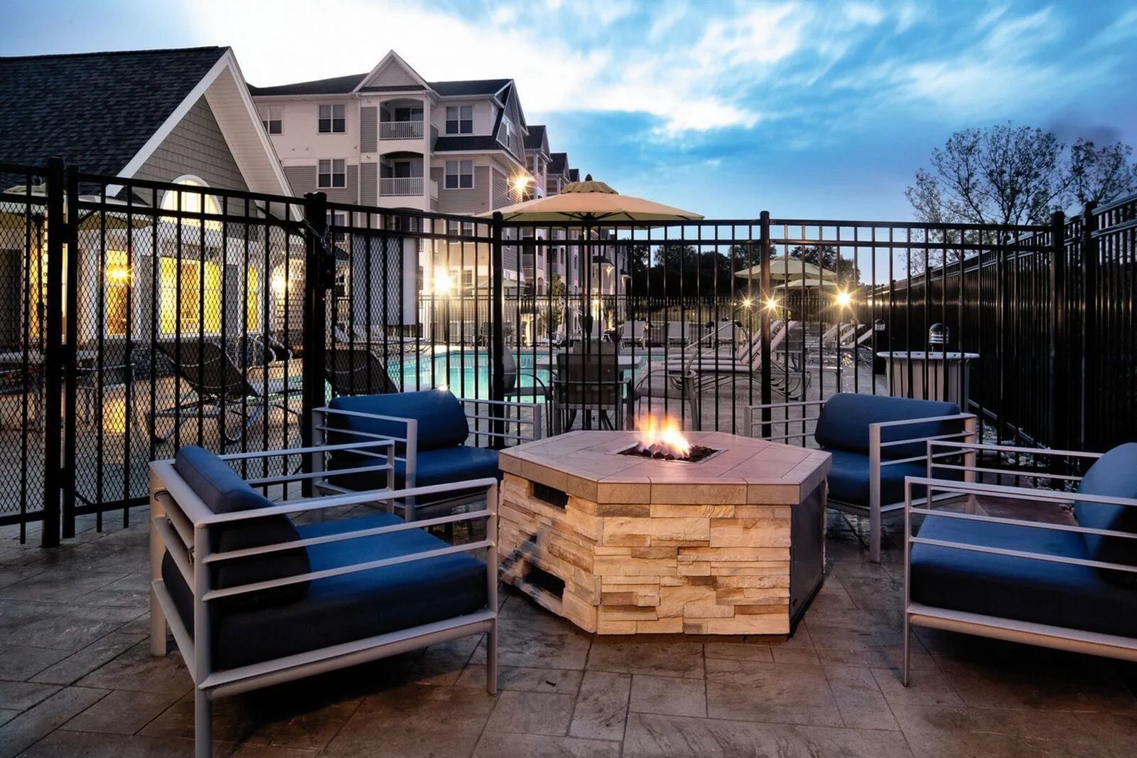 Outdoor fire pit at The Residences At Great Pond.