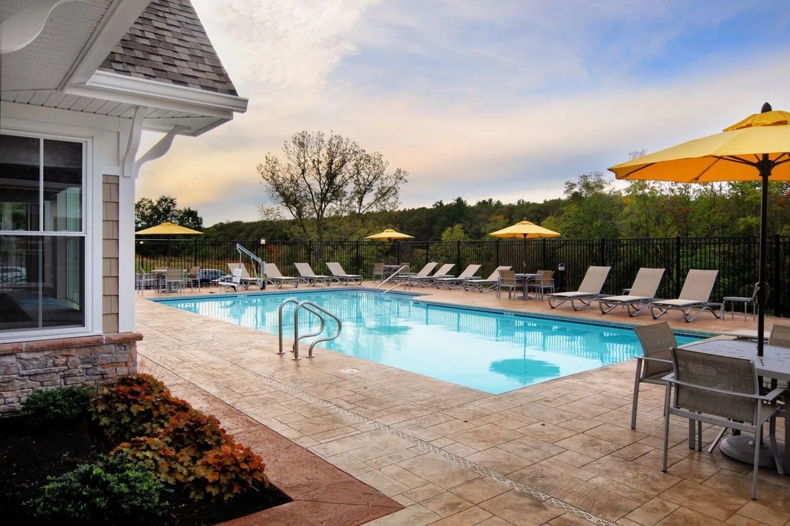 The Residences At Great Pond apartment community outdoor pool.