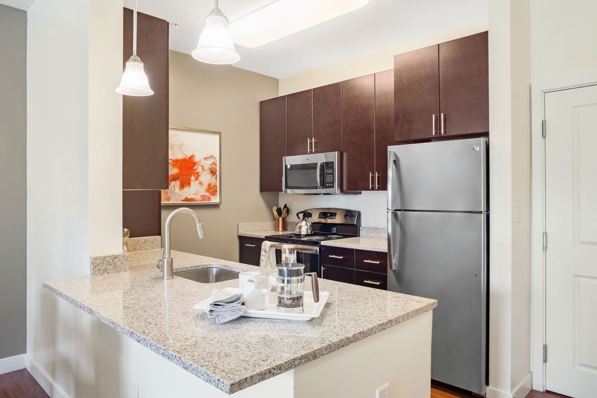 The Residences At Great Pond kitchen with island.