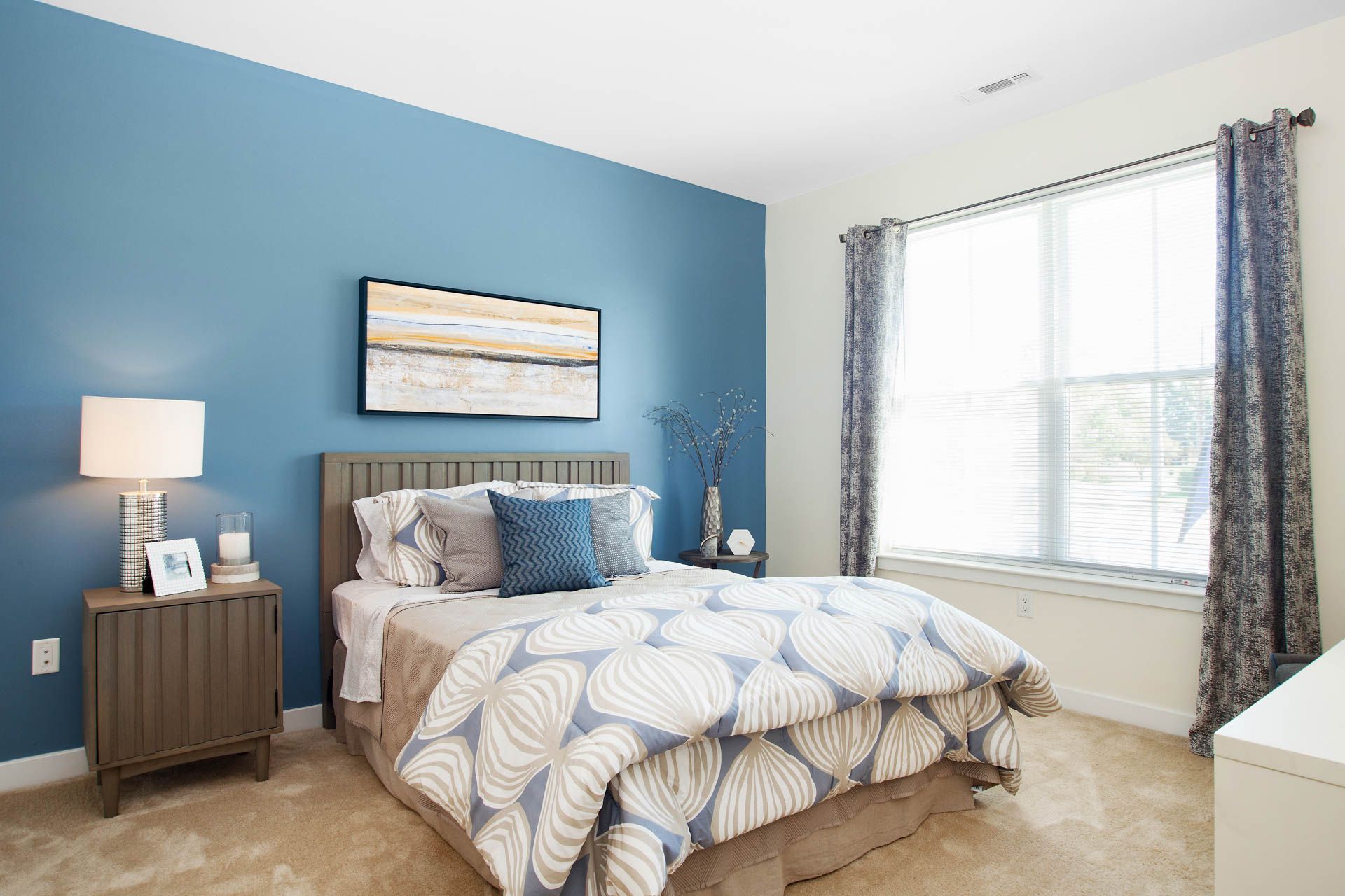 Modern apartment bedroom at The Residences At Great Pond.