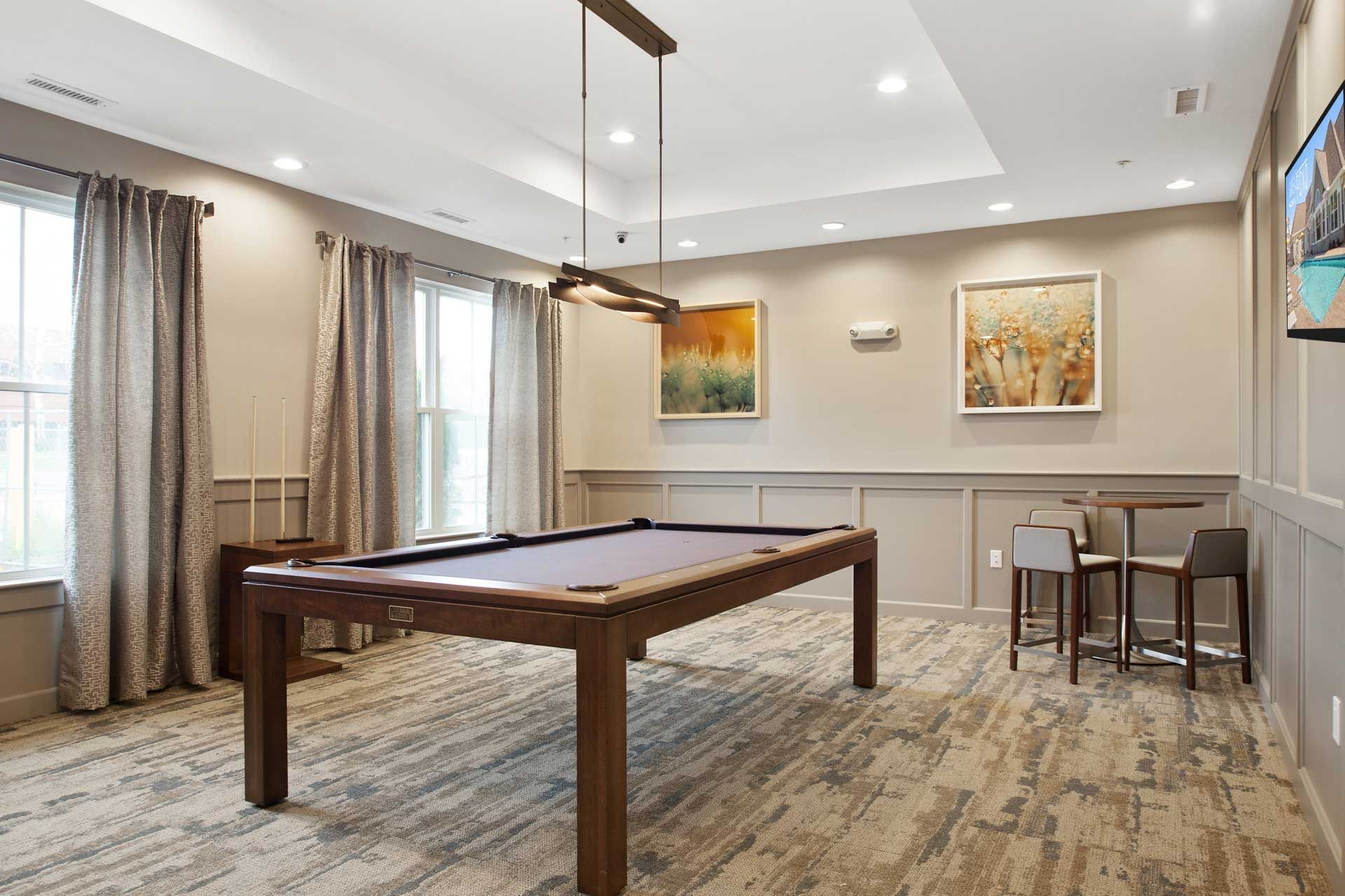 The Residences At Great Pond apartment clubhoue with billiard.