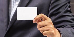 Psychiatry Practice — Business Man Handing a Blank Business Card in Trenton, NJ