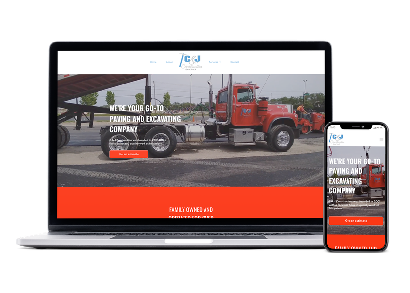 A laptop and a cell phone are displaying a website for a construction company.