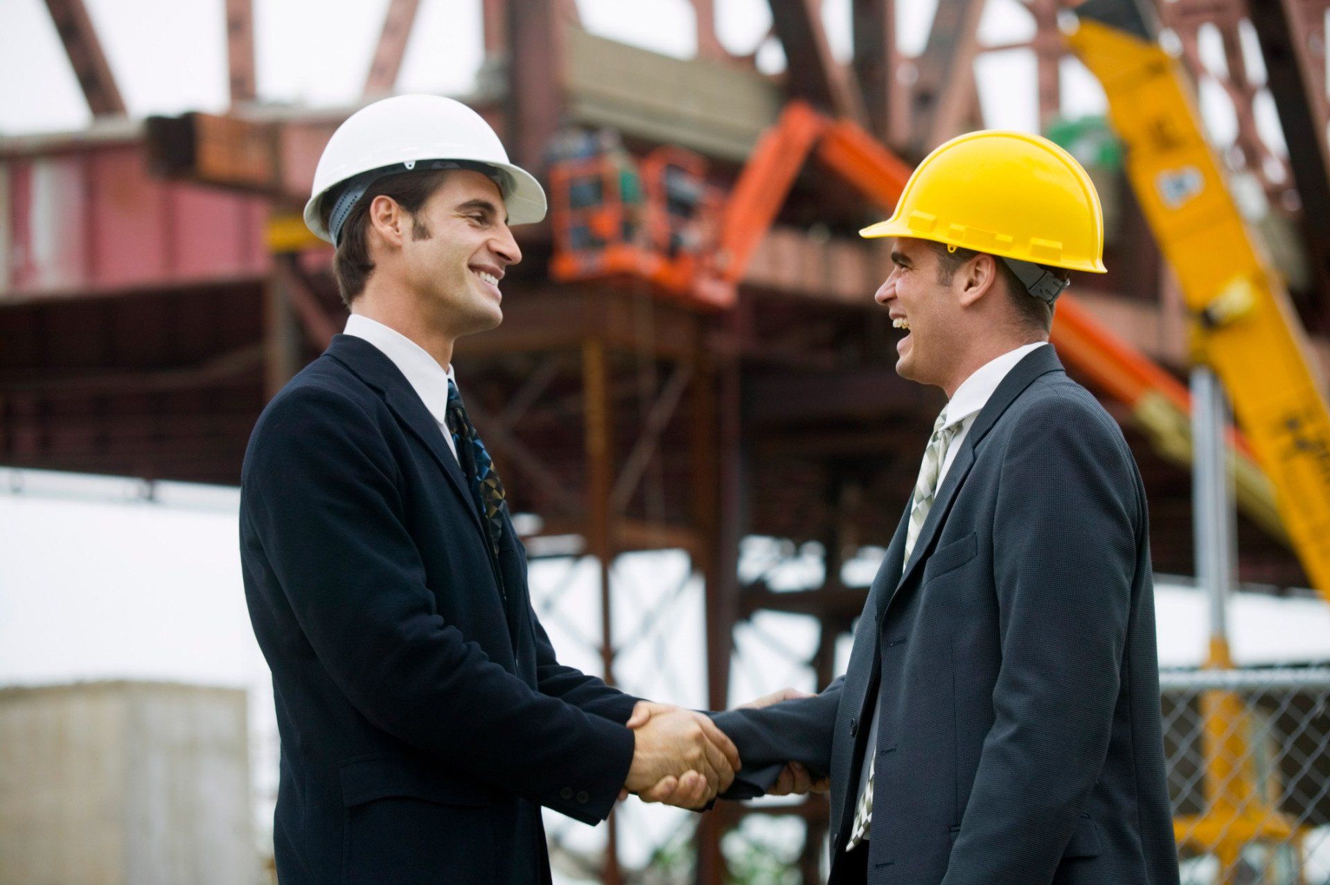 Two Expert Shaking their Hands — Manchester, MO — Adams Burke & Associates LLC