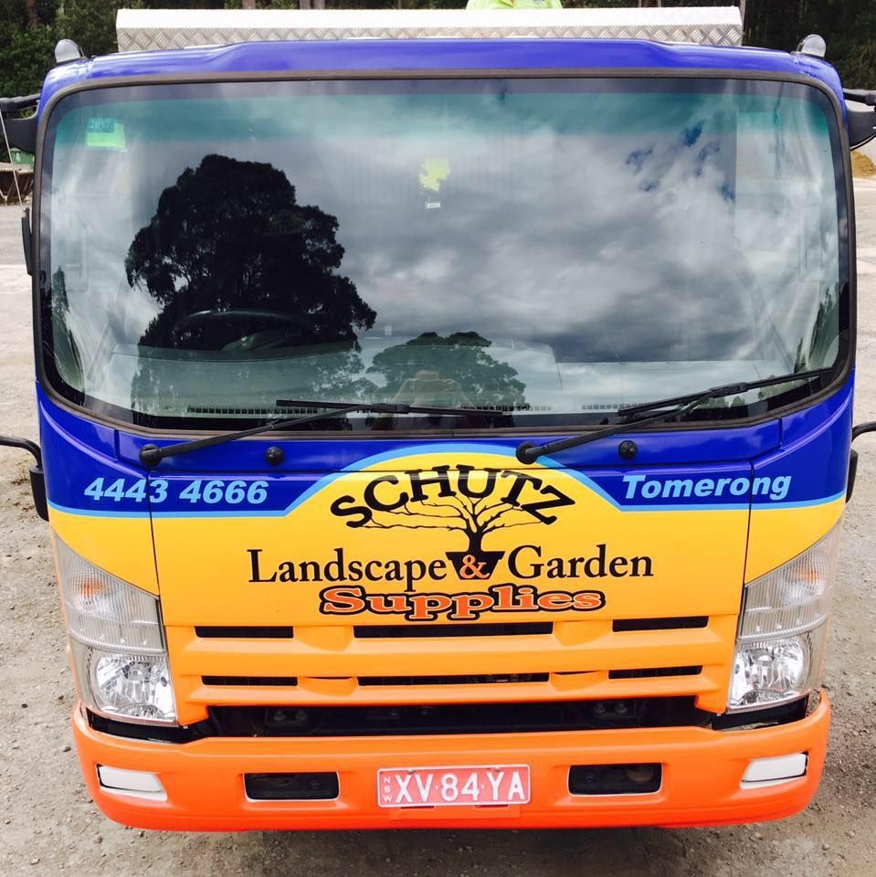 A Blue And Yellow Truck That Says Landscape Garden Supplies — Schutz Landscape and Garden Supplies in Tomerong, NSW
