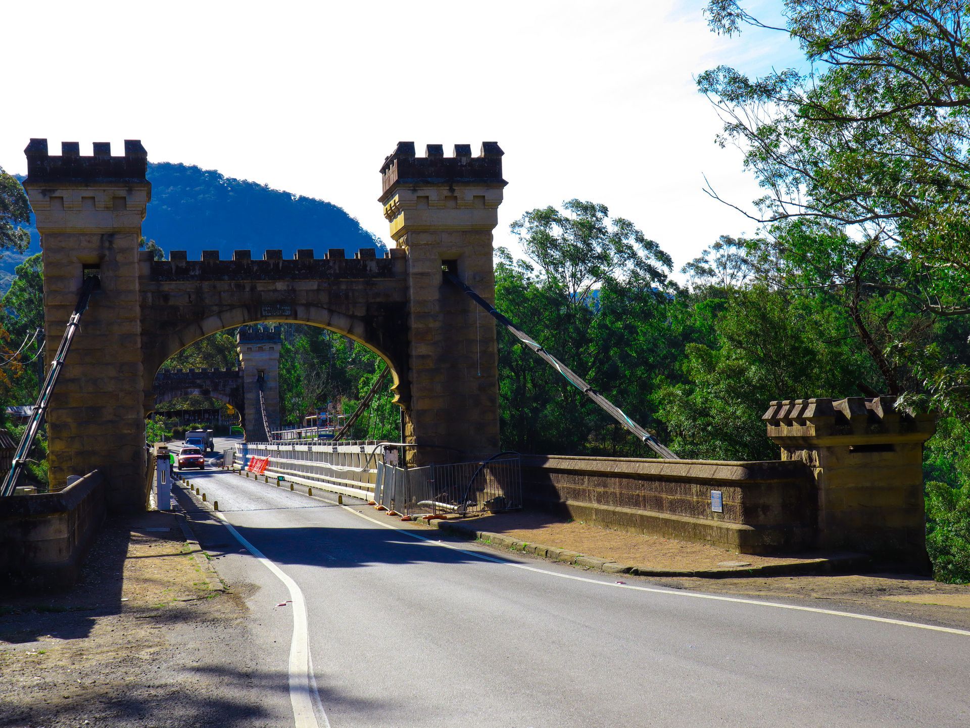 A Bridge Over A Road With Cars Driving Underneath It — Schutz Landscape and Garden Supplies in Berry, NSW