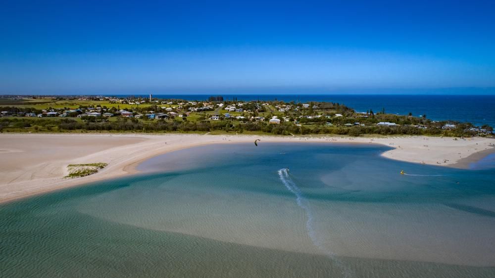 An Aerial View Of A Beach And A Body Of Water — Gympie Septic Pump Outs In Palmwoods, QLD