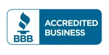 The bbb logo is blue and white and says accredited business.