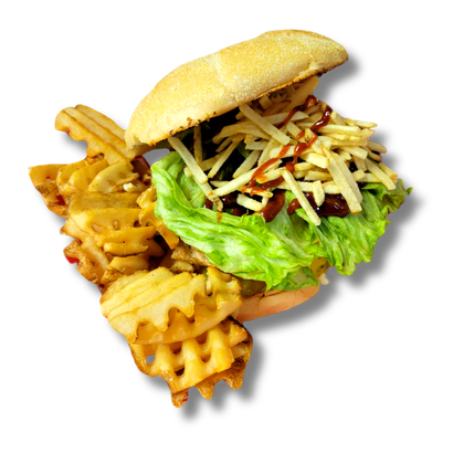 A sandwich with lettuce and french fries on a bun