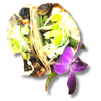 A taco with a purple flower on top of it