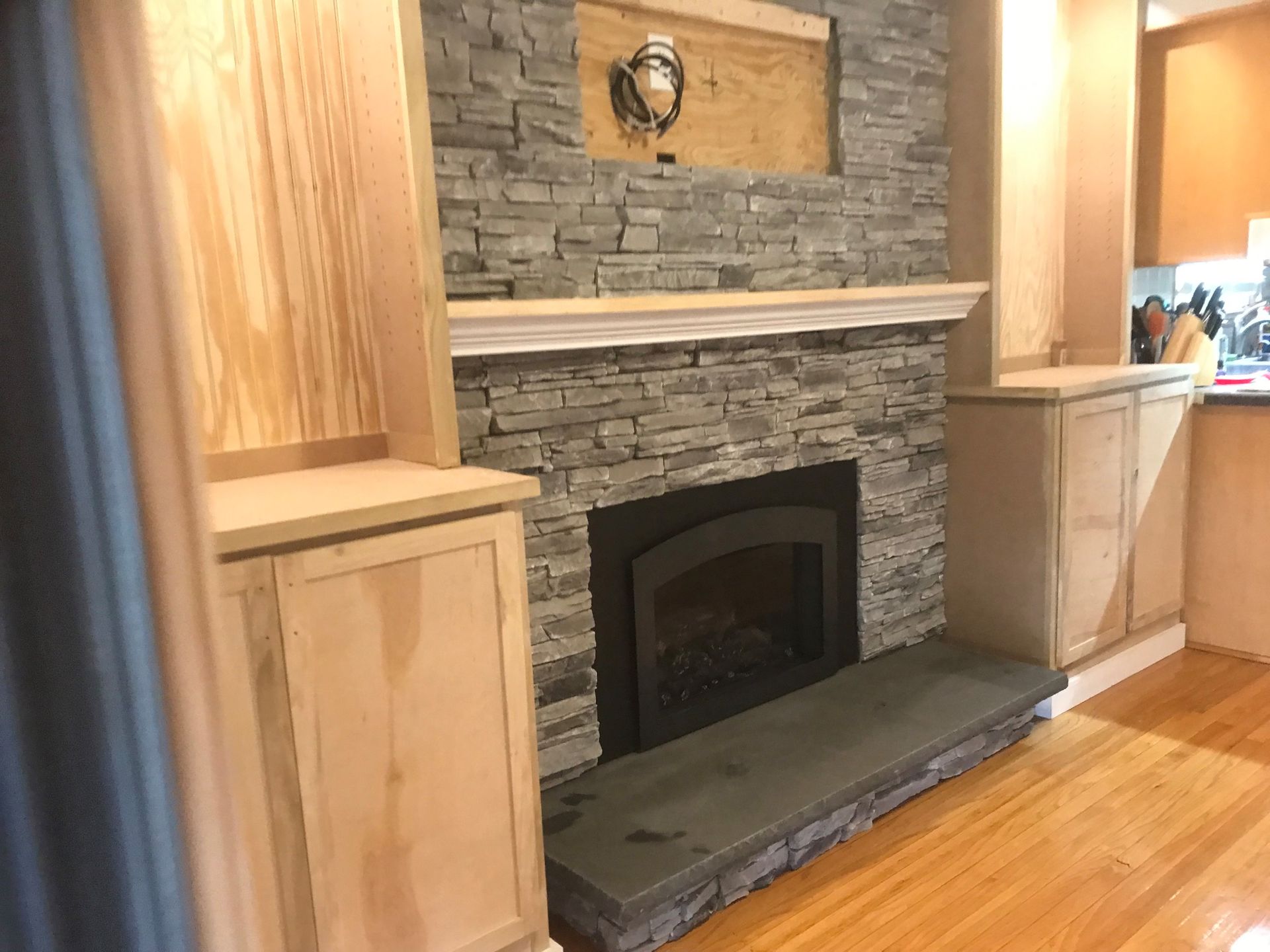 There is a fireplace in the middle of the room.