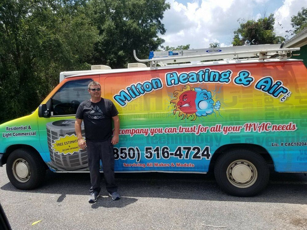 Man standing beside a colorful Milton Heating & Air service van with company logo and phone number.