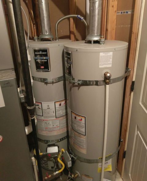 HVAC Repair — Worker Set Up Central Gas Heating Boiler in Utah Valley, UT