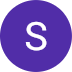 The letter s is in a purple circle on a white background.