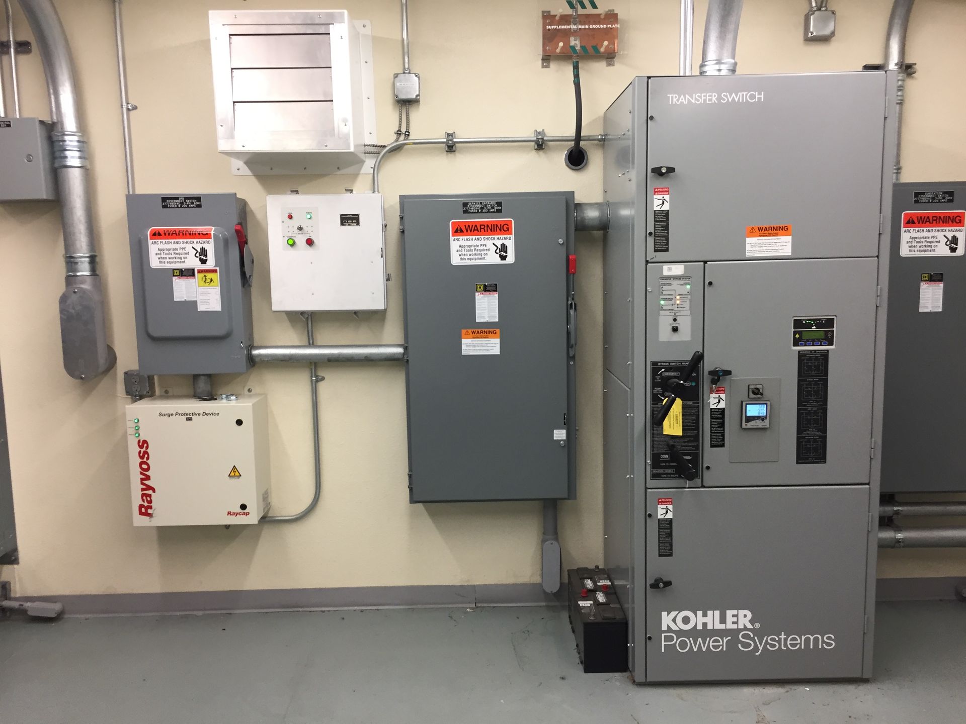 a close up of a person working on an electrical box .