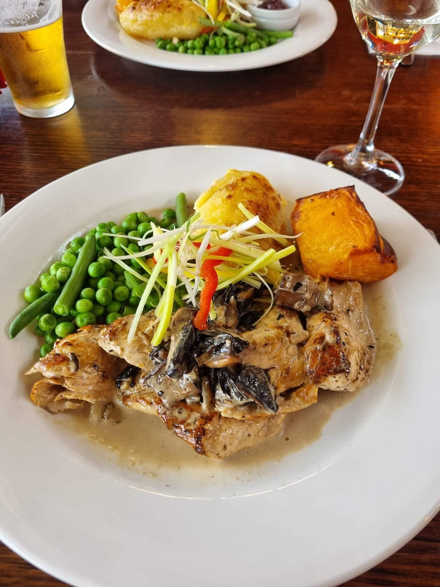 plate of roast vegetables and chicken roast.