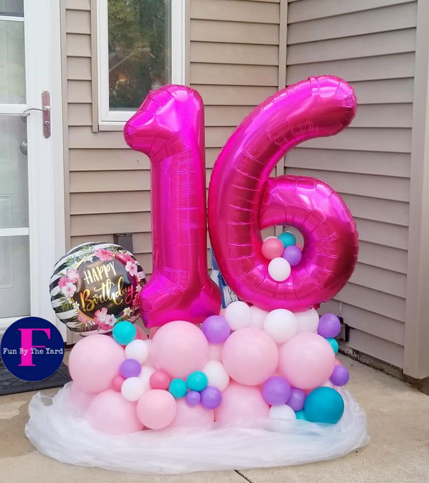 The number 16 is surrounded by pink and purple balloons. Balloon Marquee