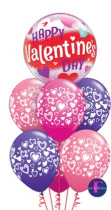 A bunch of valentine 's day balloons with hearts on them