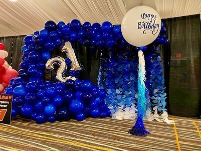 Blue balloon arch with 