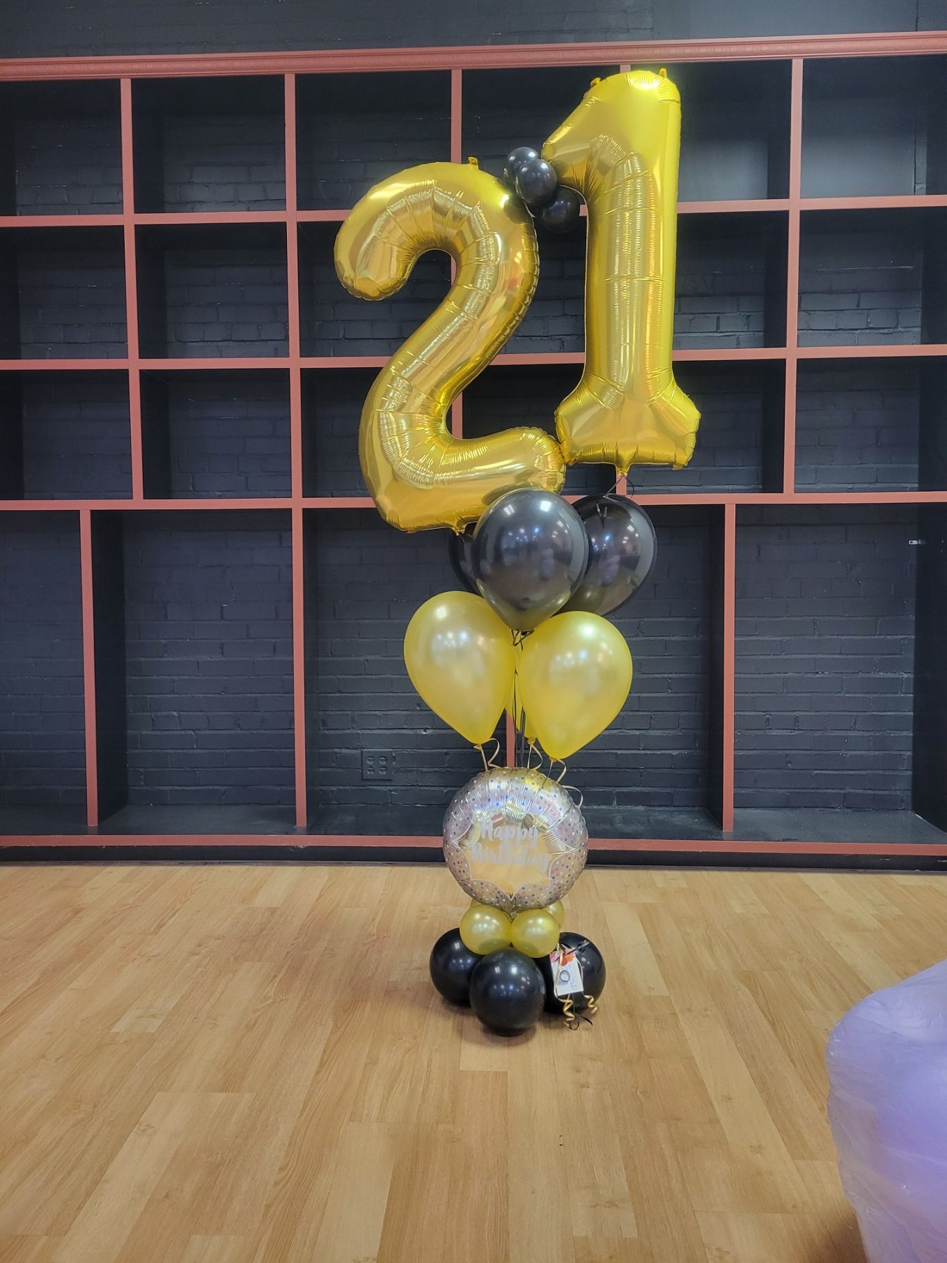 Helium balloons with the number 21 on them