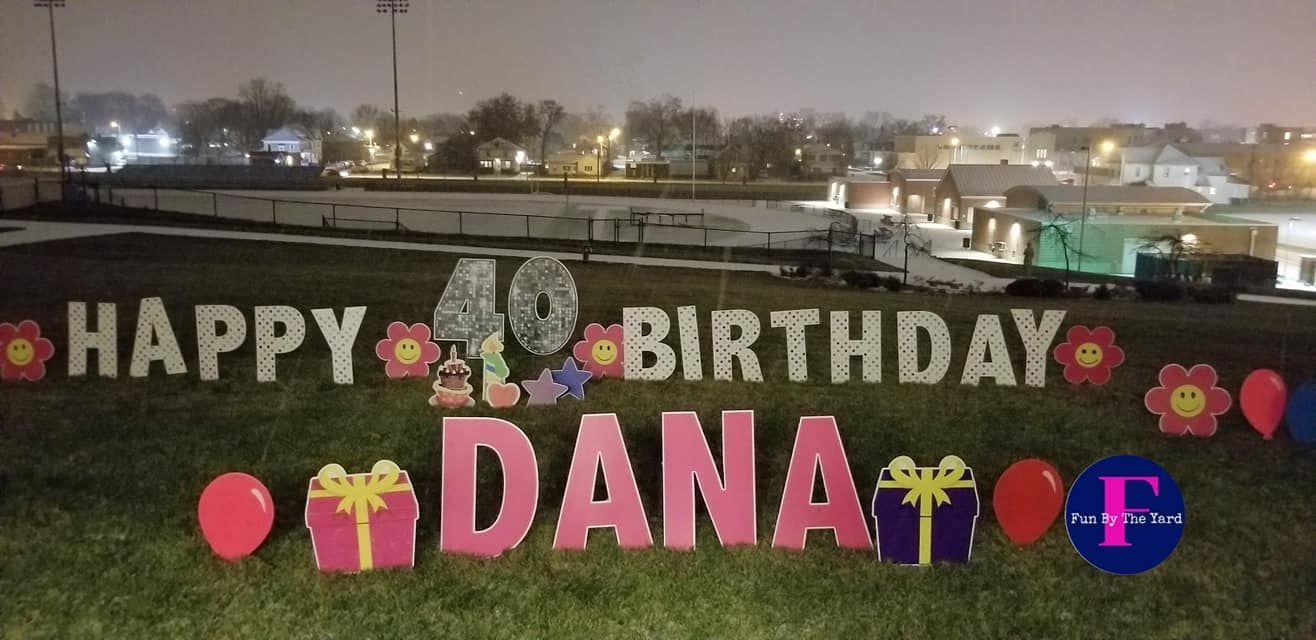 A sign that says happy 40th birthday dana